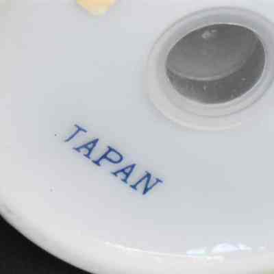 Marked "Japan" on bottom of each shaker.