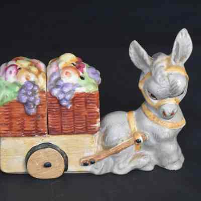 Vintage ceramic donkey with a wagon of fruit salt and pepper shakers. Made in Japan.