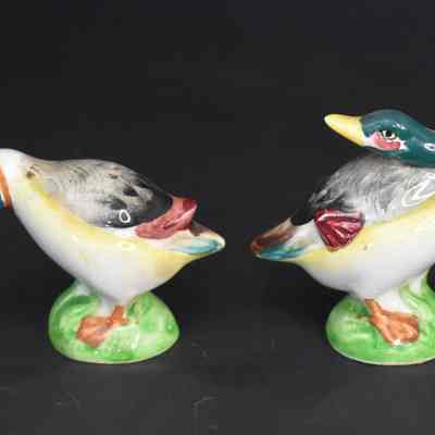 Vintage porcelain duck salt and pepper shakers. Made in Japan.