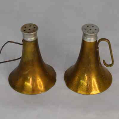 Vintage brass instrument salt and pepper shakers.