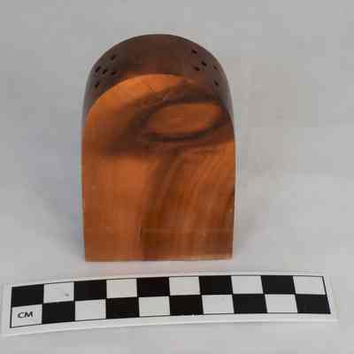 Other side and size comparison of wooden combination salt and pepper shaker.