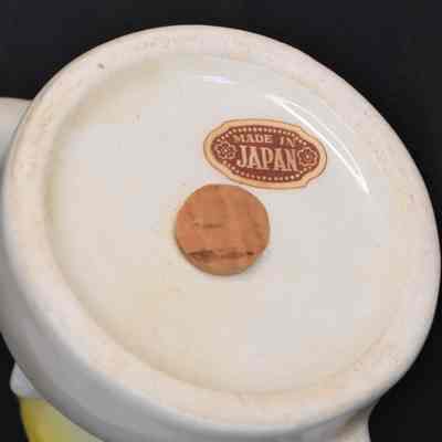 Original label "Made in Japan" on each shaker.