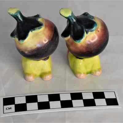 Back and size comparison of beets salt and pepper shakers.