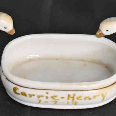 Separated birds with basin marked "Carrie - Henry 7-7-14"