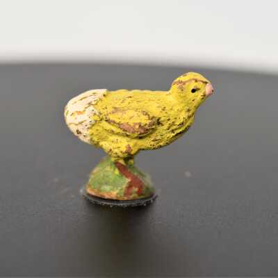 22021.1.23r (this chicken has an egg still attached to its backside): h=24.50mm, w=12mm