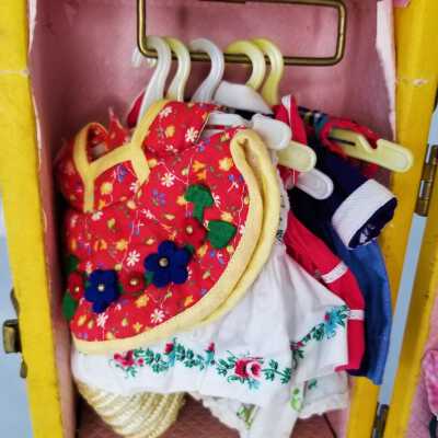 Hanging outfits: Dress in front by Vogue company