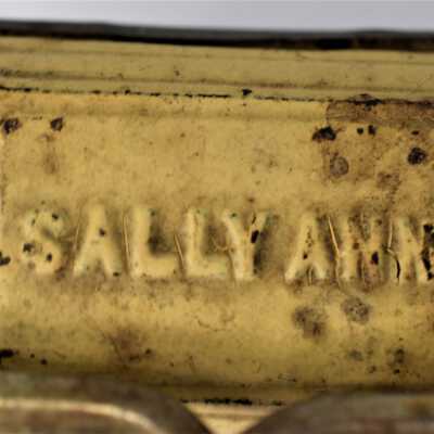 Sally Ann: Written on the top of the sweeper