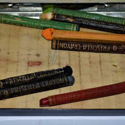 Tin contents with remaining crayons