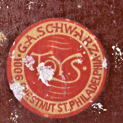 The sticker for the G.A. Schwarz Toy and Fancy Emporium in Philadelphia