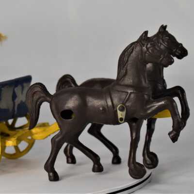 Cast Iron surrey with horses, driver, and passenger: Left Side