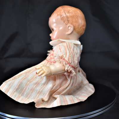 Here you can see the seam from the mold used to make the doll