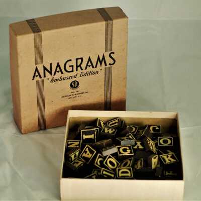 Interior of Anagrams game: 90 total letter pieces
