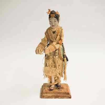 Figurine in Tan Dress