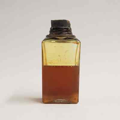 Square Glass Bottle with Unknown Liquid