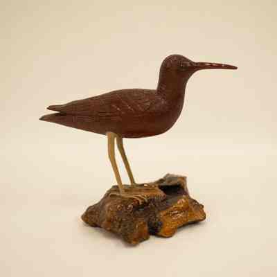 Long-Legged Stilt Wood Carving
