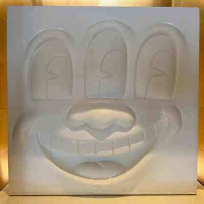 THREE EYED FACE STATUE (KEITH HARING)