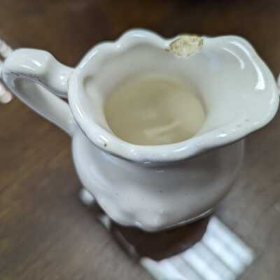 1800s handmade pottery with white glaze creamer