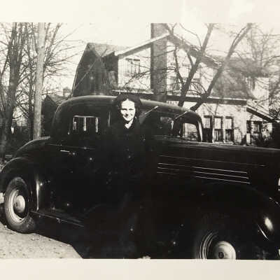 Marcia E Talbert standing in front of a car at 307 North Union Street Westfield, Indiana