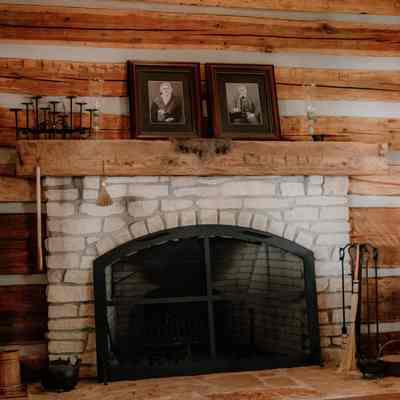 Log cabin East wall with fireplace