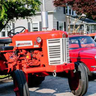 International Harvest Tractor and VW Sports car at car show