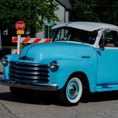 Blue Chevrolet Pickup Truck at car show