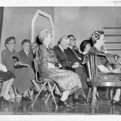Group of people during event honoring Elizabeth Commons
