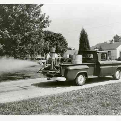 Black and White Photo of Truck With Fogging Device