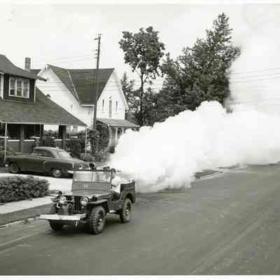 Black and White Photo of Willys Jeep With Fogger