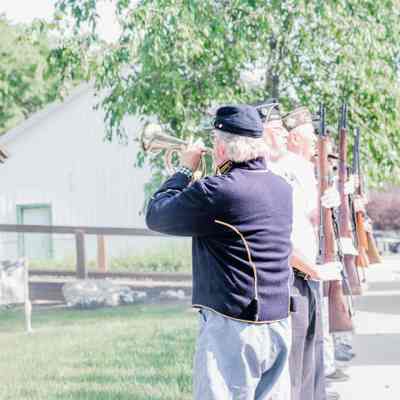 Taps being played before the ribbon cutting