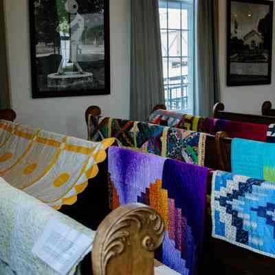 Quilt show during June 3rd event inside the Assembly Room of the City Hall / Old Methodist Church