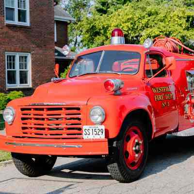 3rd Westfield Firetruck 1950s Studebaker during car show on Penn Street