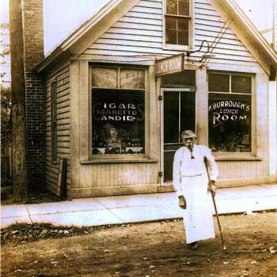 Kemp Burroughs in front of Store