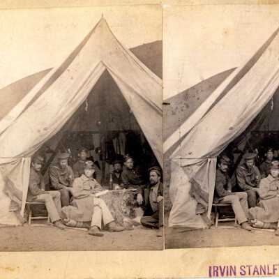 Men in Mess tent from Irvin Stanley