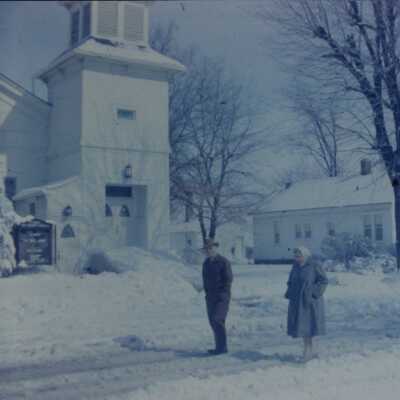 Snow Pictures First Methodist Church 130 Penn Street Two People walking in the road