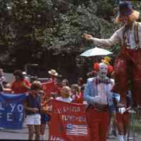          Alison Lightner holding the Glenwood Playground flag (center).
   