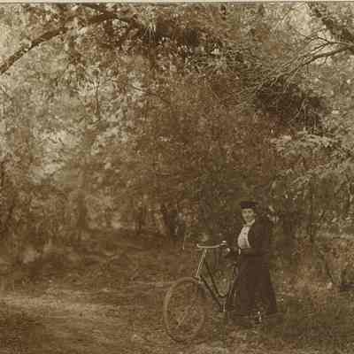 Snow: Young Woman with a Bicycle