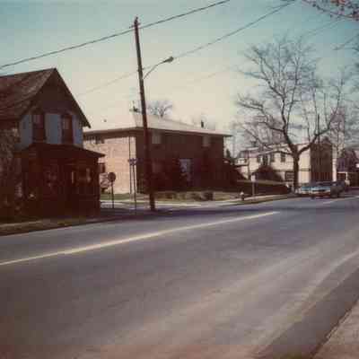 Vacant store and apartments on both sides of Ocean Street