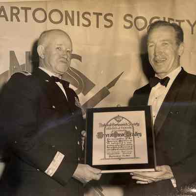 Dunn: Bob Dunn hands the Award of Honor to General Omar Bradley, 1965