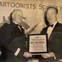 Dunn: Bob Dunn hands the Award of Honor to General Omar Bradley, 1965