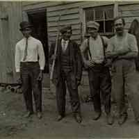 Marshall-Schmidt Album: Workers Outside Wooden Building