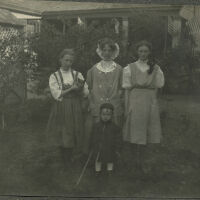 Marshall-Schmidt Album: Margaret Marshall, Two Girls and Young Boy Standing in Yard