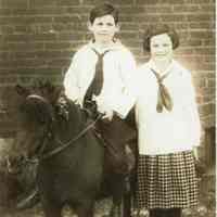 Lonergan: Boy on Pony with Girl Standing Alongside