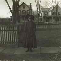 Marshall-Schmidt Album: Ada Marshall-Schmidt Standing on Sidewalk in front of houses