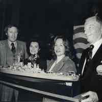 Thompson: Grace Thompson, Gloria Patrizio, Alexander Lyon with Model of Battleship New Jersey, 1976