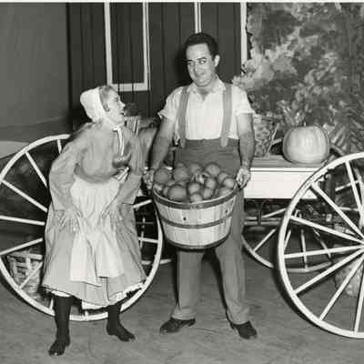 Jack Harrold asks Grace Olson, "Wanta buy my apples?" in Plain and Fancy, 1056.