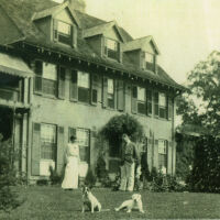 Rhodes: Effie and Frederick Leland Rhodes in the garden at 17 Birch Lane