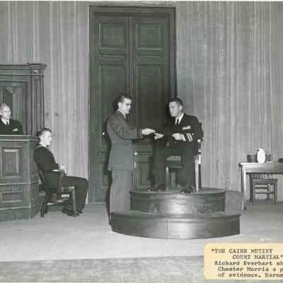 Richard Everhart shows Chester Morris a piece of evidence. Gordon Barnes at R in The Cain Mutiny Court Martial, 1955.