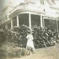 Marshall-Schmidt Album: Female Standing Outside House