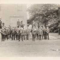 Fire Department: Millburn Firemen Standing in Front of the Old Town Hall, c. 1907