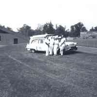 Millburn-Short Hills Volunteer First Aid Squad: Ambulance Parked in Field by MHS